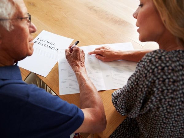 A probate attorney helping a senior with their estate planning
